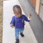 Toddler in purple for awareness day